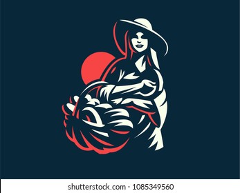 A Female Farmer In A Hat With A Basket Of Vegetables And Fruits. Vintage Vector Logo.