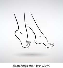 female feet on a light background