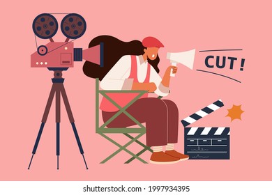 Female film director at work. Flat style illustration of a woman director using megaphone and shouting cut while recording filmin the movie making process - Shutterstock ID 1997934395