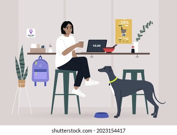 A female freelancer having lunch with their pet in a dog friendly cafe, a counter with bar stools