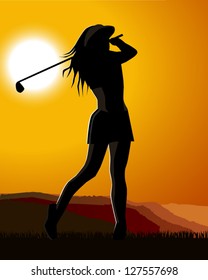 Female golfer playing at sunrise/sunset