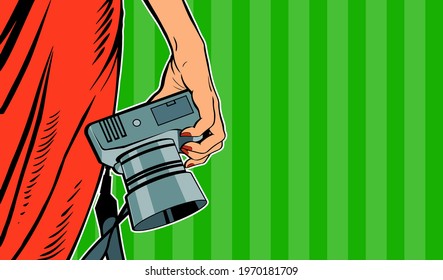 Female hand with a camera. Woman in a red dress. Photographing in the studio. Vector banner illustration in pop art style on a green background