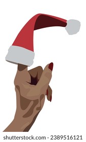 Female hand with christmas hat on top of the index finger