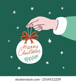 Female hand with Christmas tree decoration. Arm holding Christmas ball on green background. Holiday vector illustration for print, poster, card, banner.