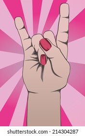 
Female hand during a rock concert making the Sign of the horns 
