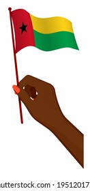 Female hand gently holds small flag of Guinea Bissau. Holiday design element. Cartoon vector on white background