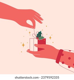 Female hand gives xmas gift box to another hand. Christmas red present decorated with holly leaves shares from one arm to other. Festive Vector illustration