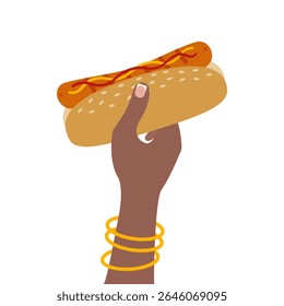Female hand with gold bracelets and French manicure hold Hot Dog with mustard and ketchup. Fast Food