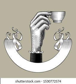 Female hand holding coffee