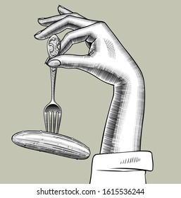 Female hand holding a fork with a cucumber. Vintage engraving stylized drawing. Vector illustration