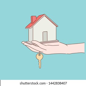 Female hand holding house key. Hand drawn style vector design illustrations.