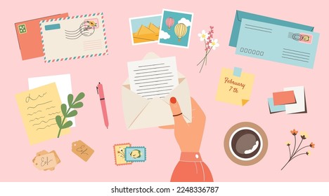 Female hand holding open envelope with writing a letter. Stamps, postcards, photo cards, stickers and a cup of coffee point of view pink background. Vector flat illustration