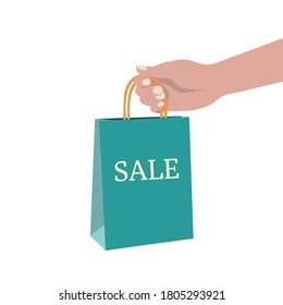 Female hand holding with paper package on white isolated background. Shopping or gift Bag. Sale sign. Sack for purchases, presents. Hand drawn vector illustration. Shopping, sale concept