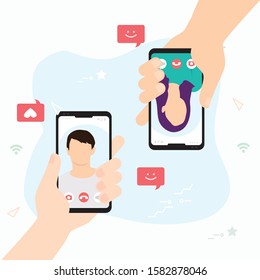 Female hand holding smartphone with boyfriend on screen.Video call concept. Video call with loved one.