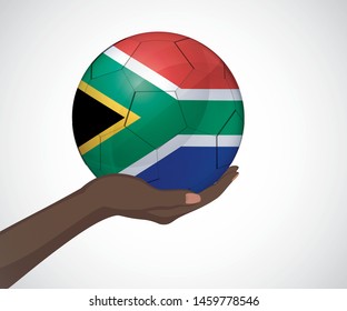 Female hand holding a soccer ball with South Africa flag color vector image