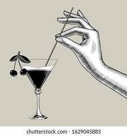 Female hand holding a straw over the cone glass with a Сherry cocktail. Vintage color engraving stylized drawing. Vector illustration