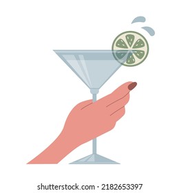 Female hand holds martini glass with a lime. Alcoholic drink. Vector illustration with a beverage isolated on a white background.