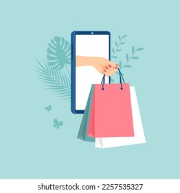 Female hand with packages coming out of smartphone screen. The concept of online shopping. Flat vector illustration
