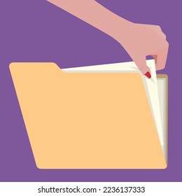 A female hand picking a document from a manila folder