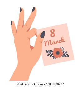 Female hand playfully holds a greeting card for International Women's day 8 March with two fingers. Vector illustration isolated on white background