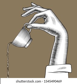 Female hand pours down a coffee from a cup. Vintage engraving stylized drawing. Vector illustration