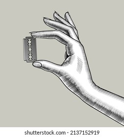 Female hand with a safety razor blade in fingers. Vintage stylized drawing. Vector illustration