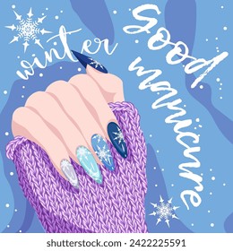 Female hand with winter manicure with snowflakes and a warm knitted sweater. The concept of a beautiful fashionable design on long nails. Modern nail art for the Christmas holidays.