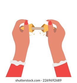 Female hands breaking fortune cookie on white background