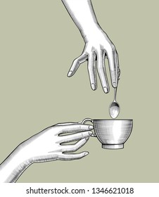 Female hands with a coffee cup and spoon. Vintage stylized drawing. Vector illustration