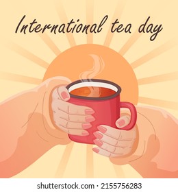 Female hands holding cup tea  International tea day 