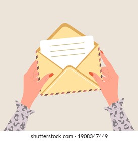 Female hands holding an open envelope with paper letter. Correspondence and mail delivery concept. Top view. Post stamps and postcards. Vector illustration in flat cartoon style.