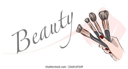 Female hands with makeup brushes