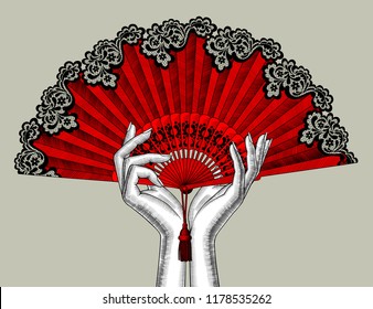 Female hands with red open fan. Vintage engraving stylized drawing. Vector illustration