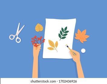 Female hands a scrap booking on blue  background. Colorful vector illustration in flat style.