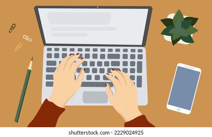Female hands working on modern laptop. Office desktop on brown background.
