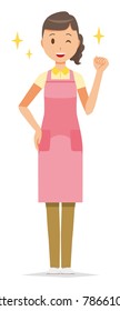 A female home helper wearing an apron is lifting a fist