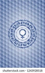 female icon inside blue emblem or badge with abstract geometric pattern background.