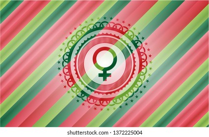 female icon inside christmas colors badge.