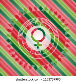 female icon inside christmas style badge..