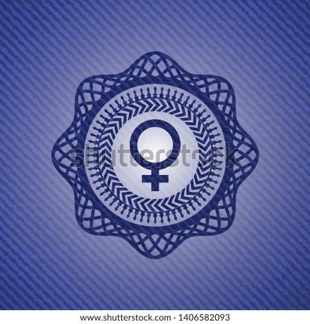 female icon inside denim background