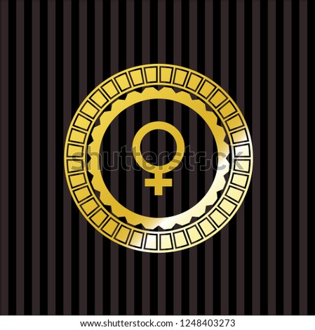 female icon inside gold emblem