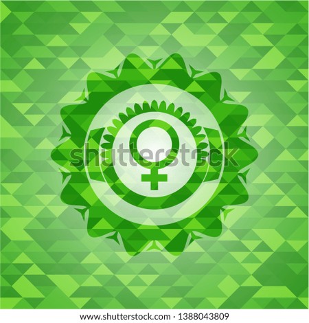 female icon inside green emblem with mosaic ecological style background