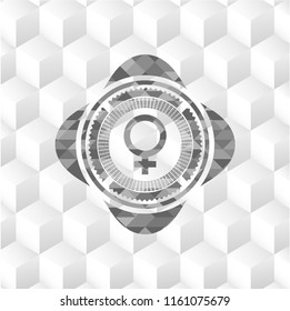 female icon inside grey badge with geometric cube white background