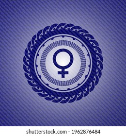 female icon inside jean background. 