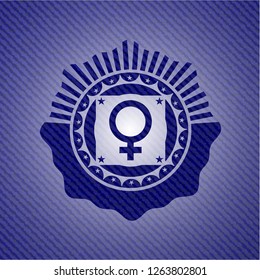 female icon inside jean or denim emblem or badge background