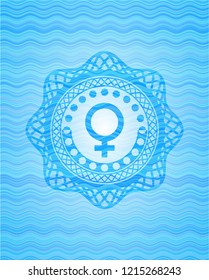 female icon inside light blue water badge background.