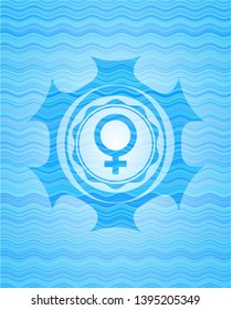 female icon inside light blue water badge background.