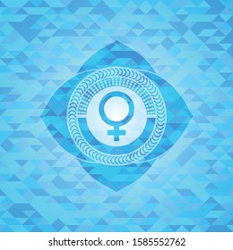 female icon inside light blue emblem with mosaic background