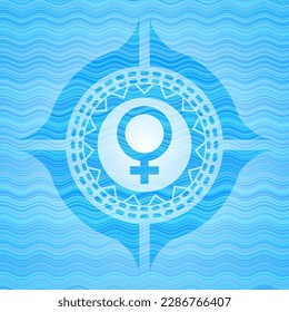female icon inside light blue water emblem. 
