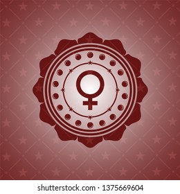 female icon inside red emblem